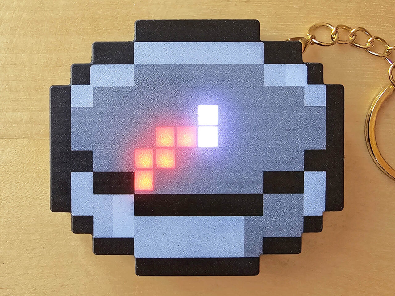 Pixel Art Kompass mit Akku oben